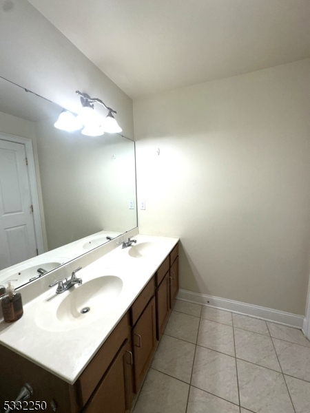 178 Front Street Elizabeth Port, NJ 07206 - Photo 10 of 19 a bathroom with a sink and a mirror