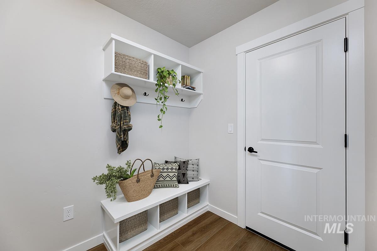1700 East Hadler Street Meridian, ID 83642 - Photo 15 of 25 Mudroom with baseboards and dark wood-type flooring