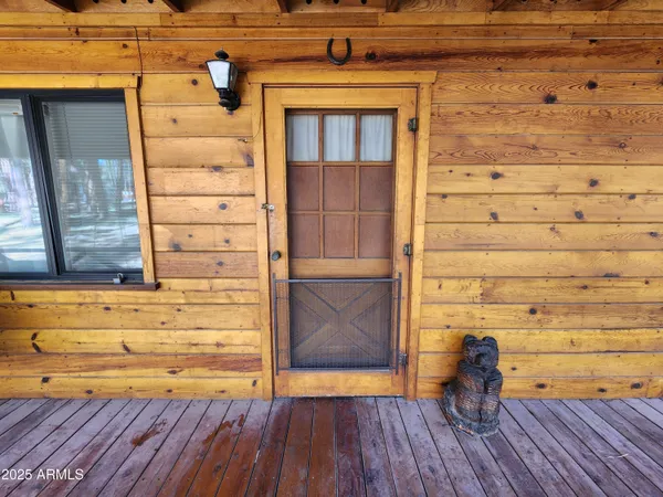 a view of door and wooden floor