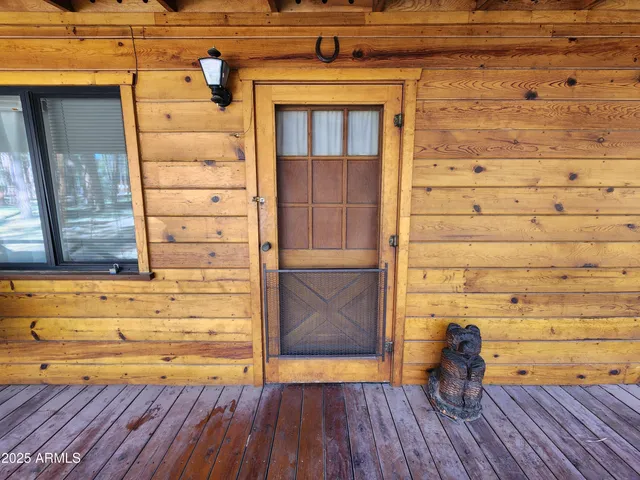 a view of door and wooden floor