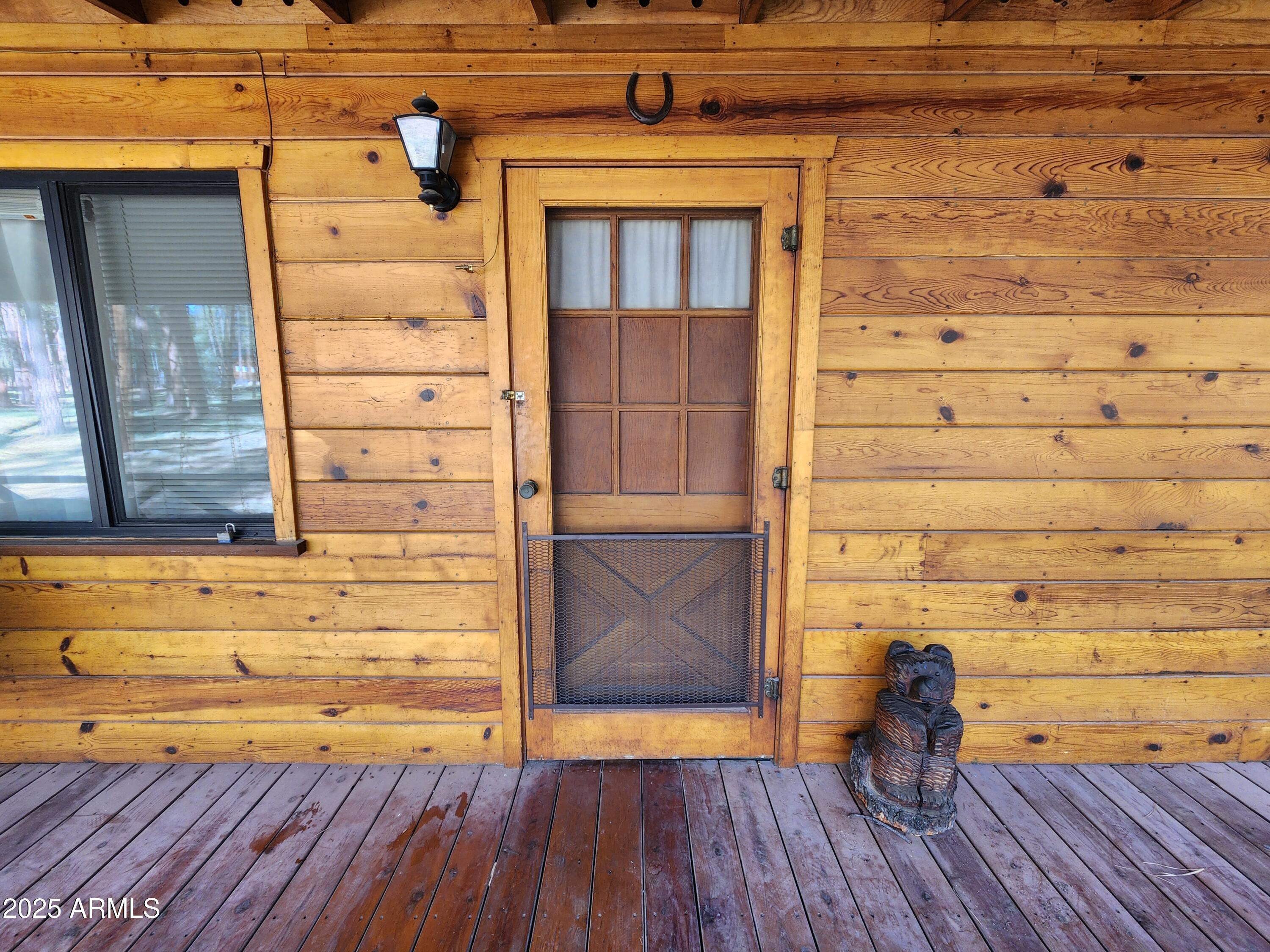 a view of door and wooden floor