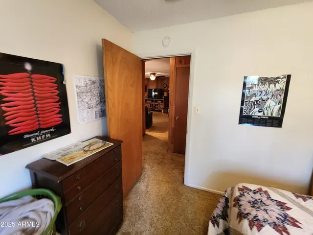 a bathroom with a sink toilet and mirror