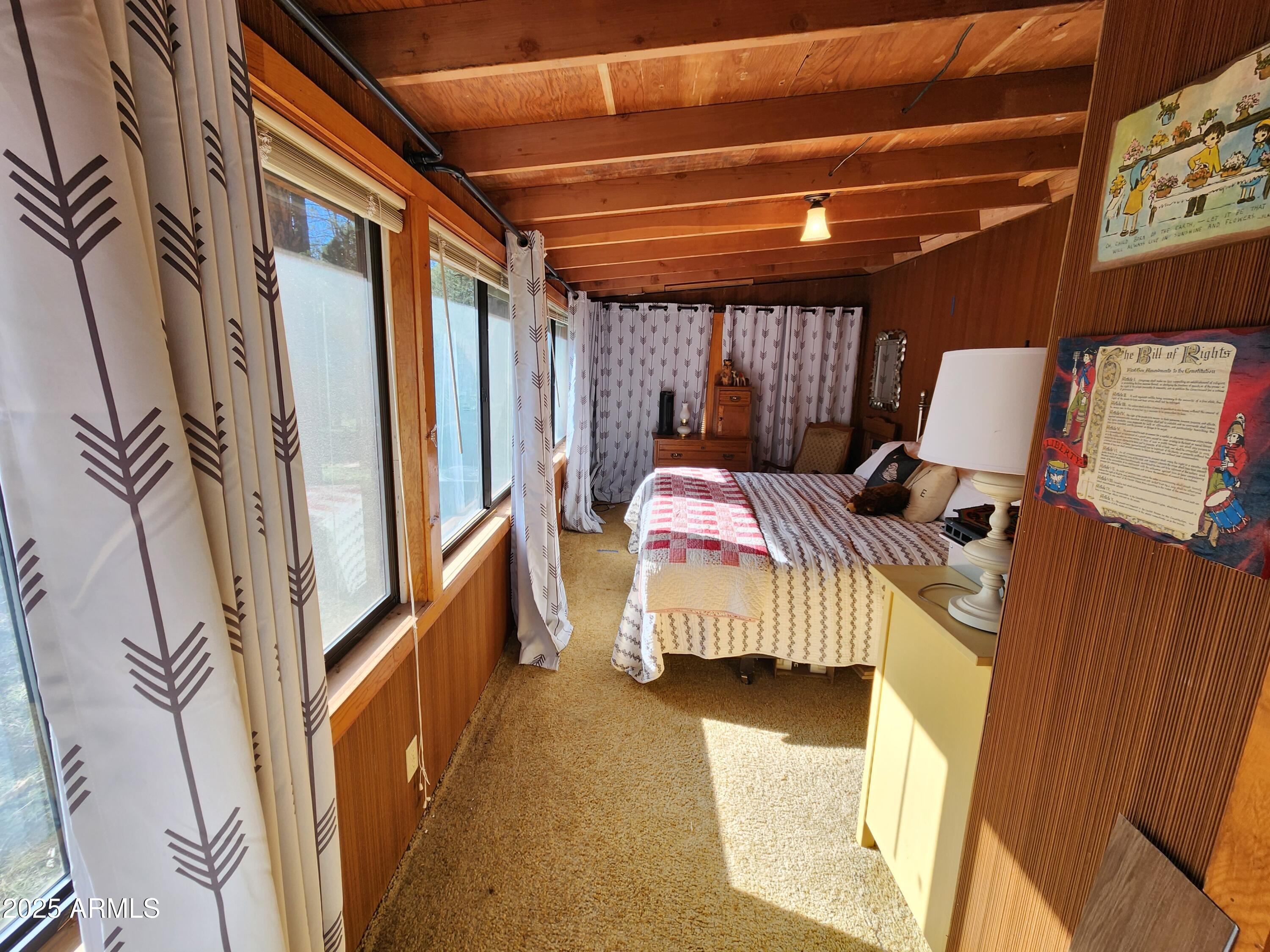 247 West Diamond Road Payson, AZ 85541 - Photo 30 of 42 a bed sitting in a bedroom next to a window