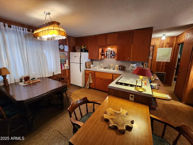 a room with furniture and pool tables