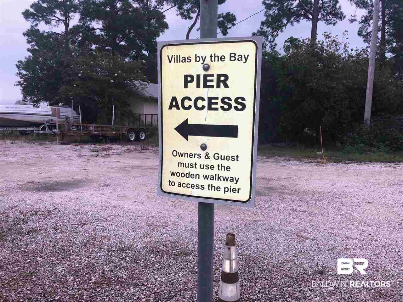 25957 Canal Road, Unit 212 Orange Beach, AL 36561 - Photo 31 of 39 Pier on Wolf Bay