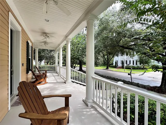a view of a patio with a table chairs and a patio