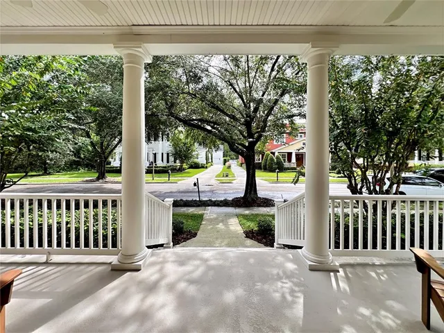 a view of a porch with a yard