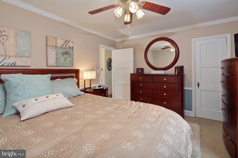 418 Overbrook Road Baltimore, MD 21212 - Photo 11 of 30 a bedroom with a bed and closet