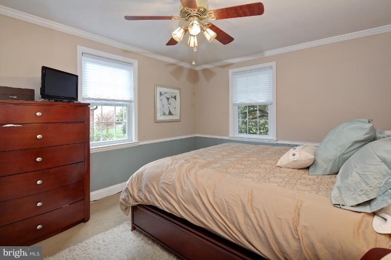 418 Overbrook Road Baltimore, MD 21212 - Photo 12 of 30 a bedroom with a bed and a window