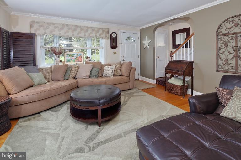 418 Overbrook Road Baltimore, MD 21212 - Photo 17 of 30 a living room with furniture and a large window