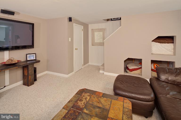 418 Overbrook Road Baltimore, MD 21212 - Photo 23 of 30 a bedroom with a bed and furniture