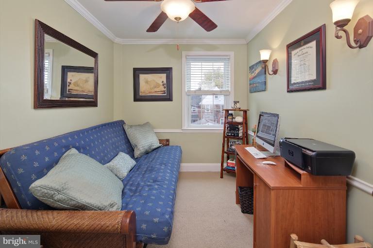 418 Overbrook Road Baltimore, MD 21212 - Photo 27 of 30 a living room with furniture and a window