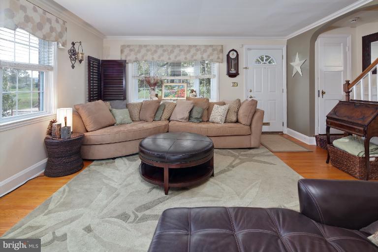 418 Overbrook Road Baltimore, MD 21212 - Photo 5 of 30 a living room with furniture a rug and a large window