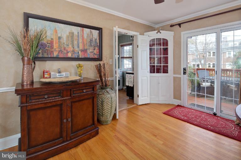 418 Overbrook Road Baltimore, MD 21212 - Photo 6 of 30 a bed room with a bed and a television