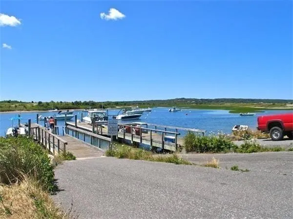 a view of a lake with a yard