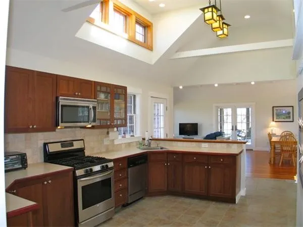 a kitchen with a stove and a sink
