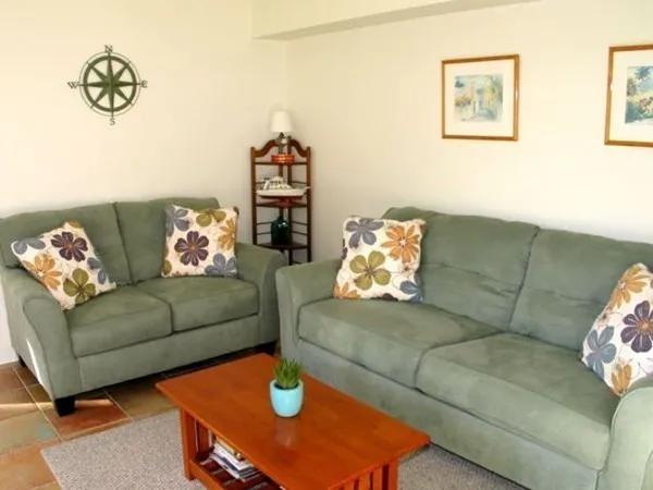 a living room with furniture and couch