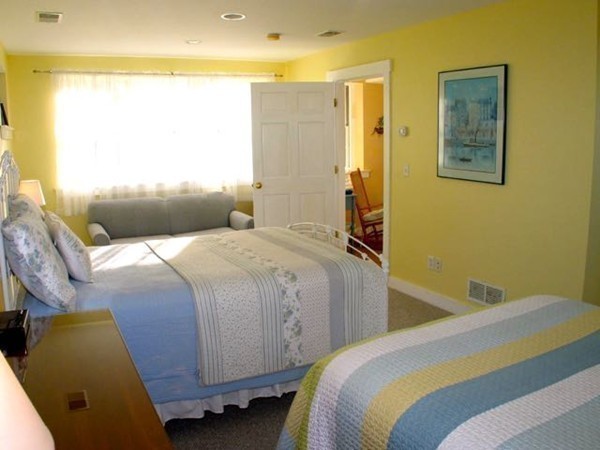 40 Lighthouse Road Aquinnah, MA 02535 - Photo 10 of 25 a bedroom with a bed and a window