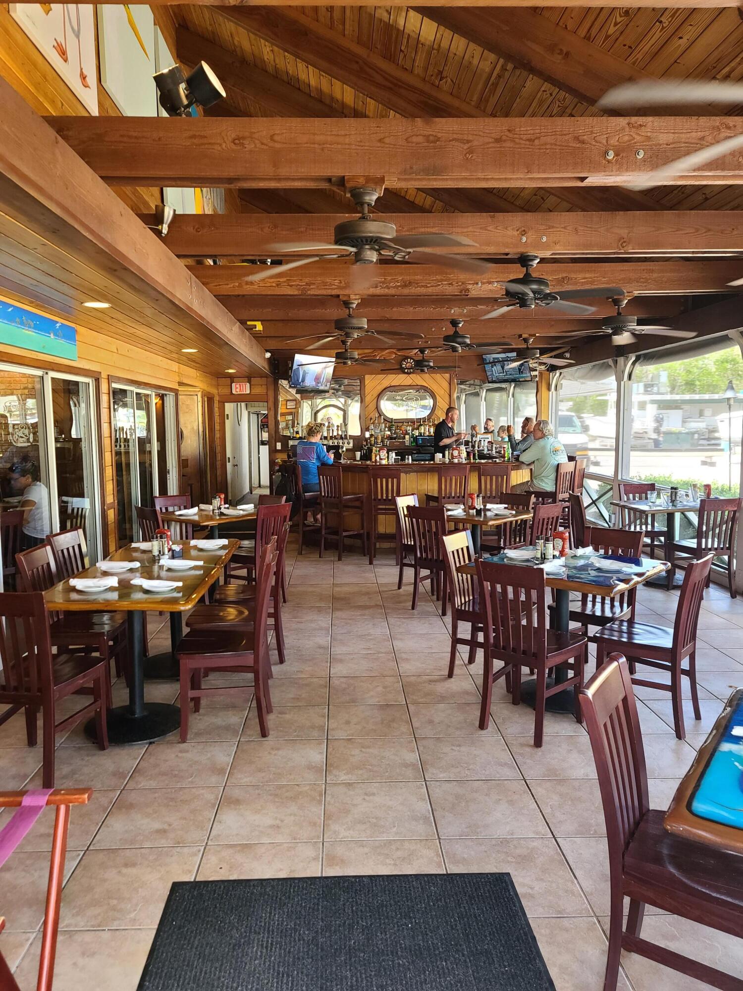 14 South Exuma Road Key Largo, FL 33037 - Photo 18 of 32 a view of a bar restaurant