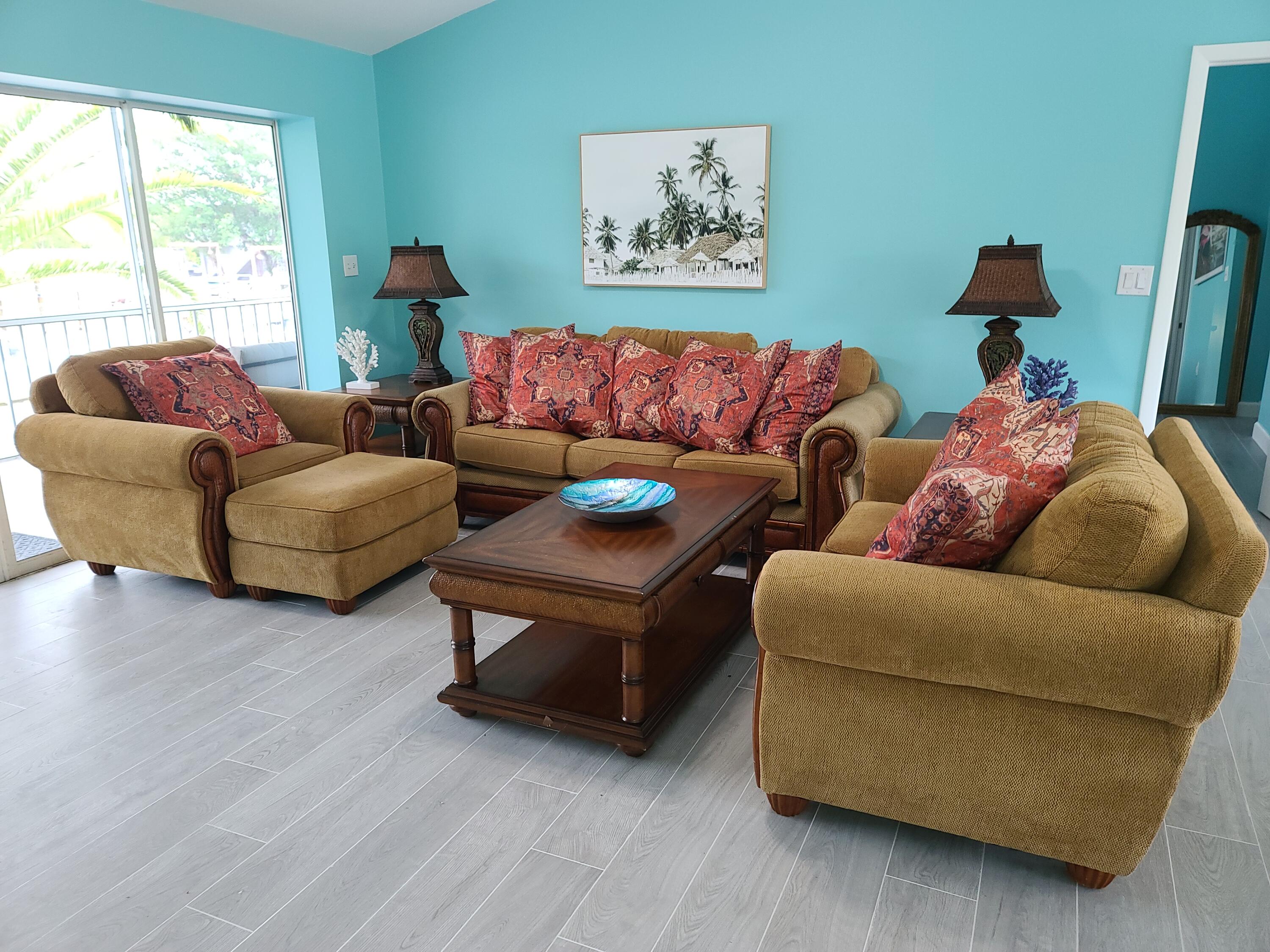 14 South Exuma Road Key Largo, FL 33037 - Photo 9 of 32 a living room with furniture and a window