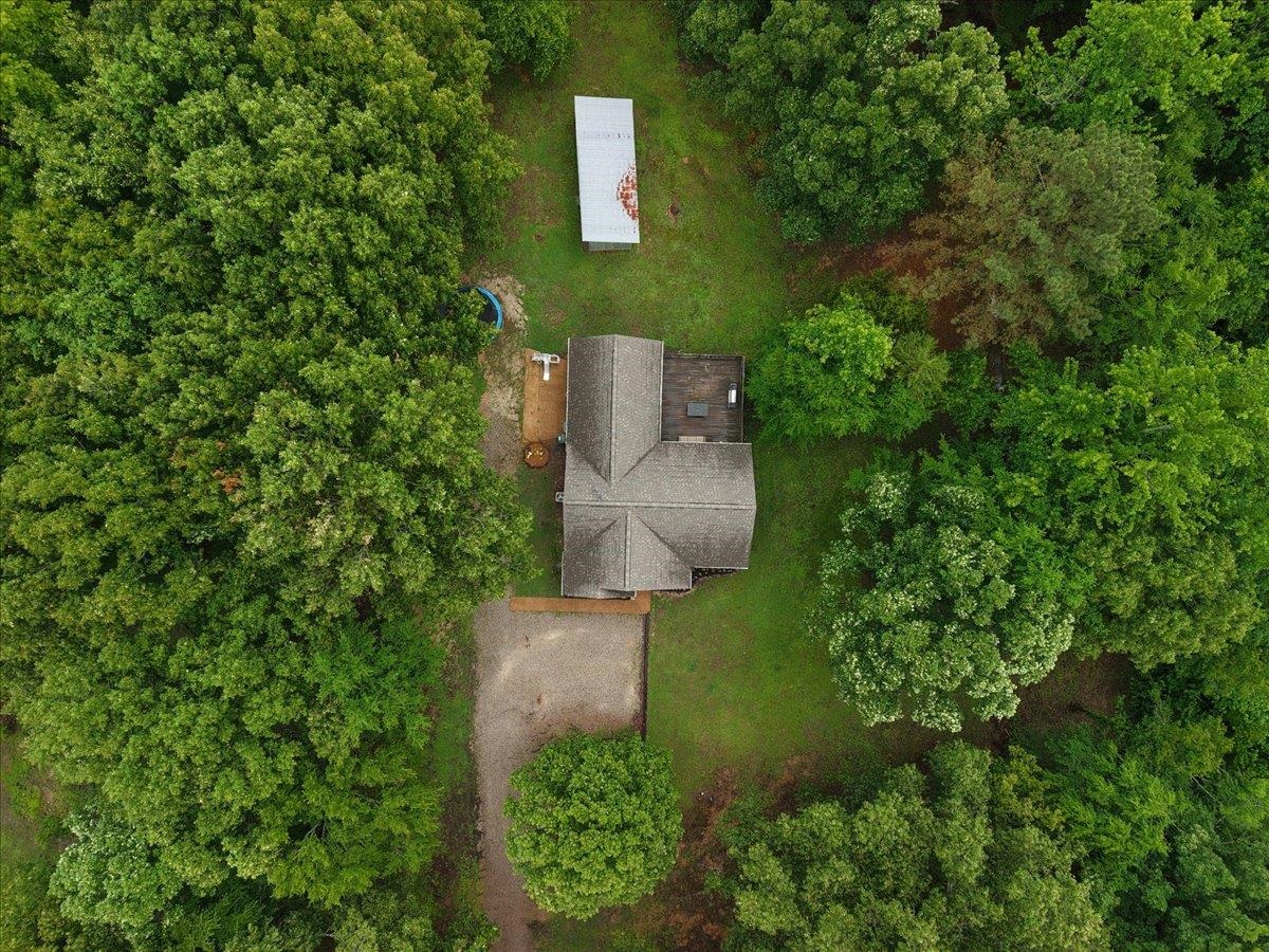 150 Liberty Road Moscow, TN 38057 - Photo 33 of 36 Aerial perspective showcasing a residential property surrounded by dense green foliage