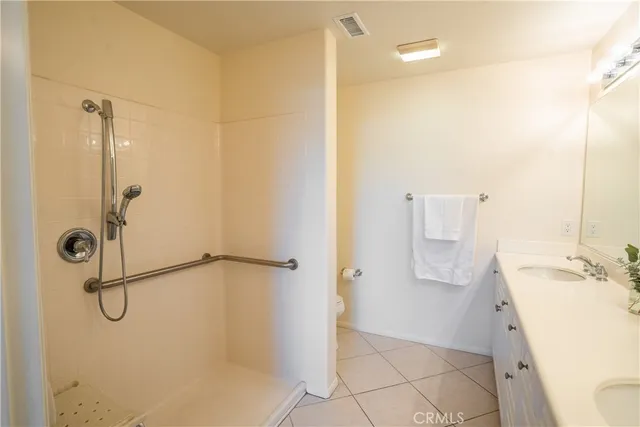 a bathroom with a sink and a shower