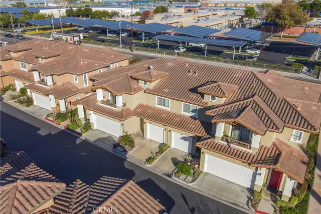 a view of a balcony with outdoor seating
