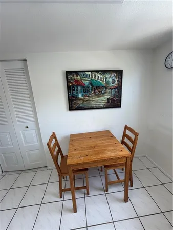 a view of a room with furniture and rug