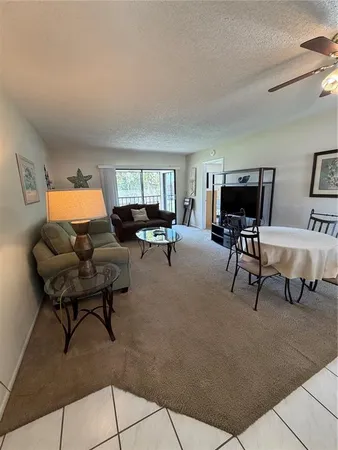 a living room with furniture and a couch