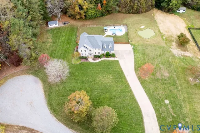 a view of a lake with a yard