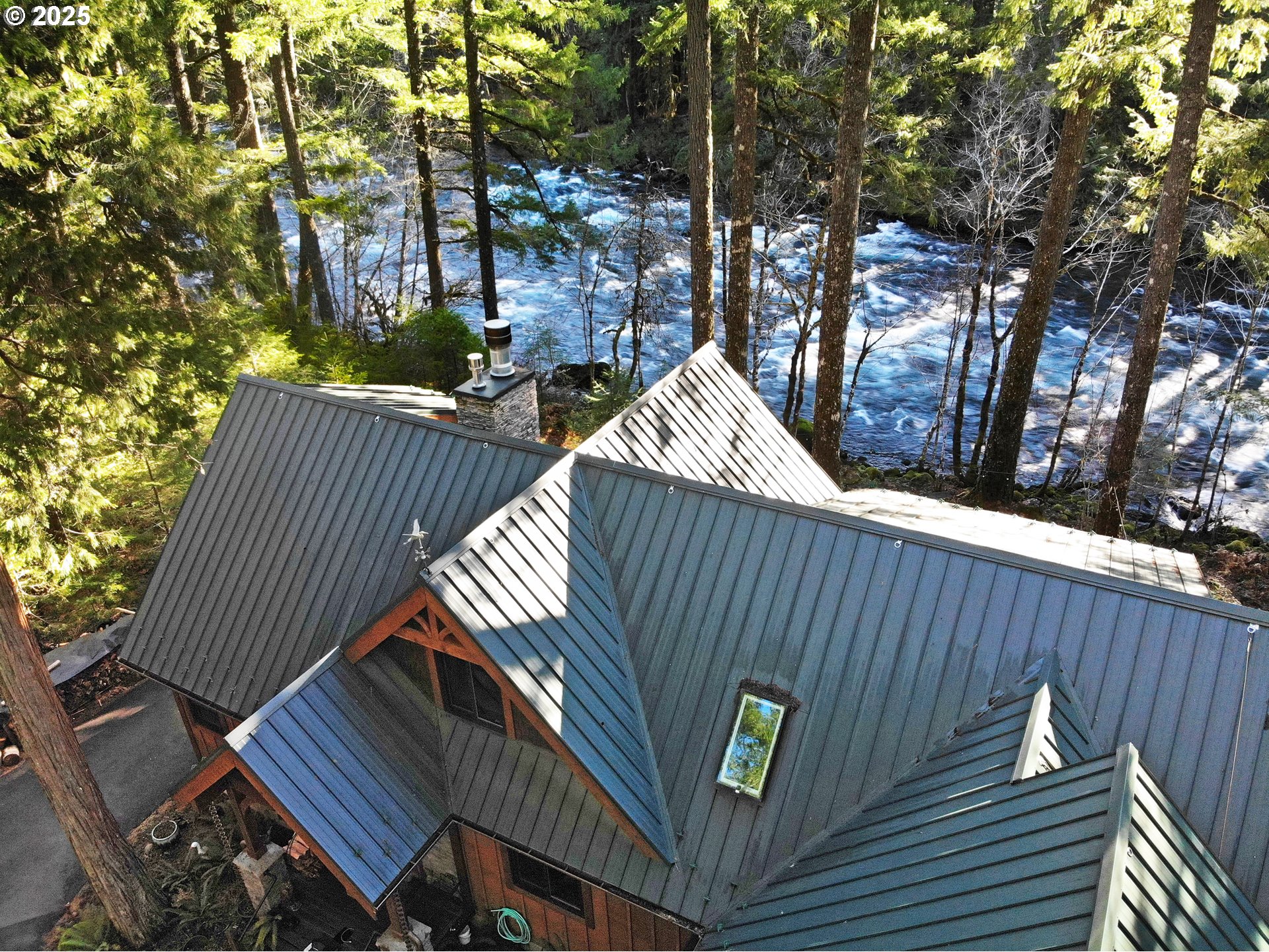 55590 McKenzie River Drive Blue River, OR 97413 - Photo 2 of 45 a view of a wooden deck