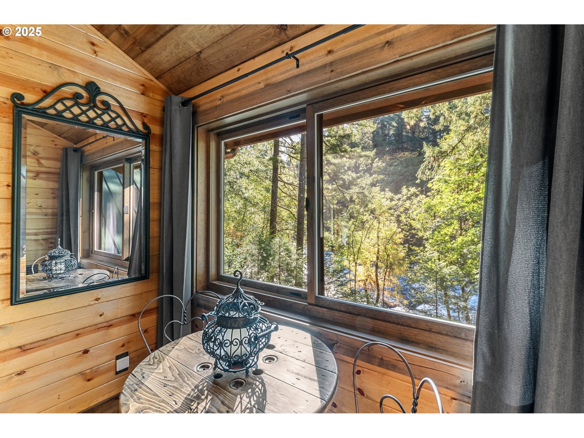 55590 McKenzie River Drive Blue River, OR 97413 - Photo 24 of 45 a view of a living room and window
