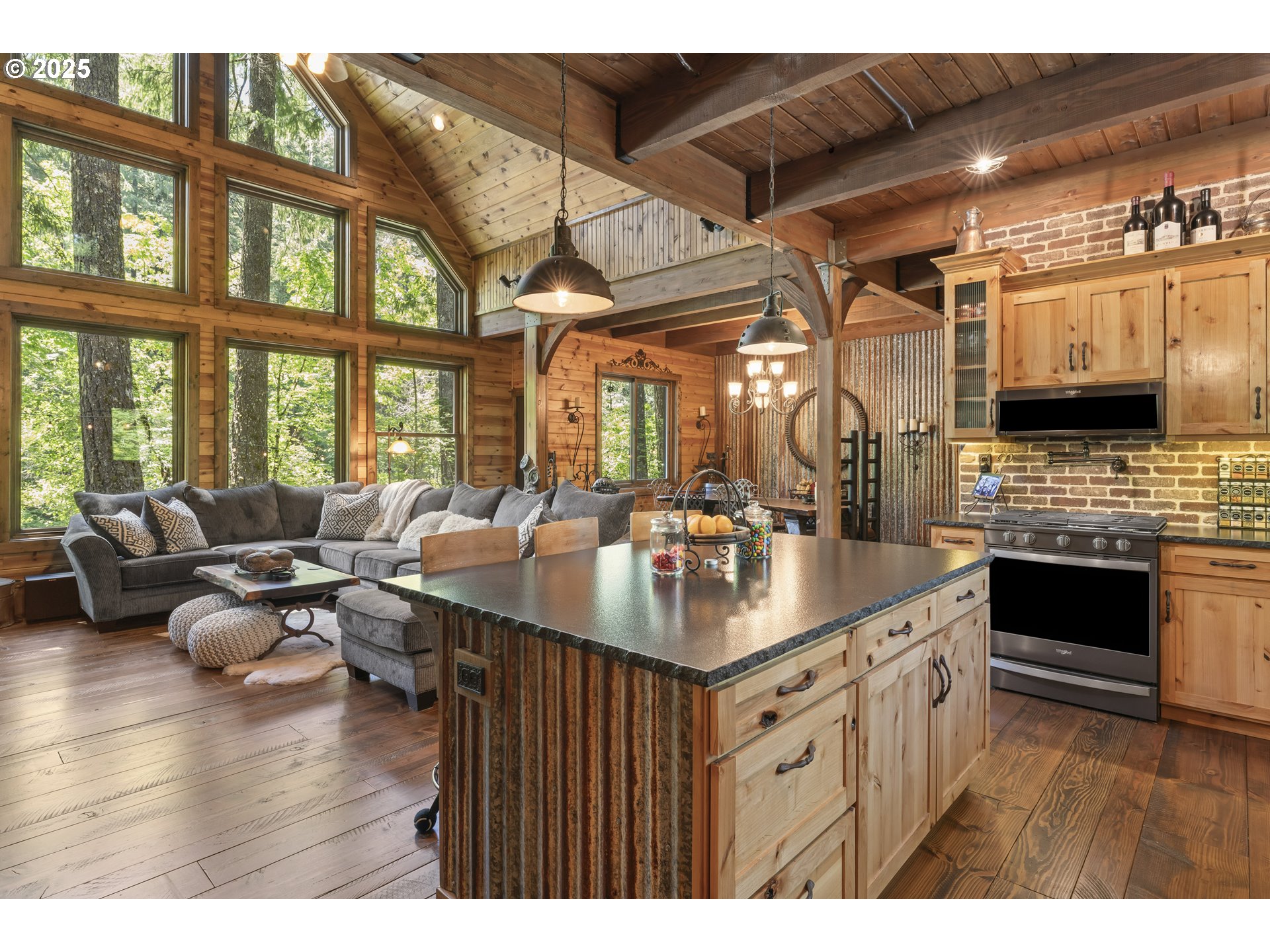 55590 McKenzie River Drive Blue River, OR 97413 - Photo 5 of 45 a kitchen with a large window and a counter space