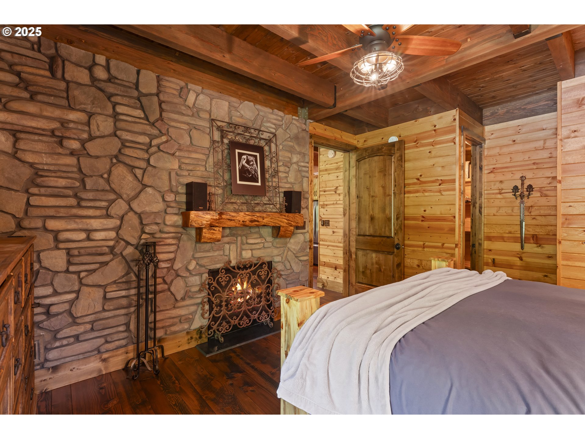 55590 McKenzie River Drive Blue River, OR 97413 - Photo 9 of 45 a bedroom with a bed and a table