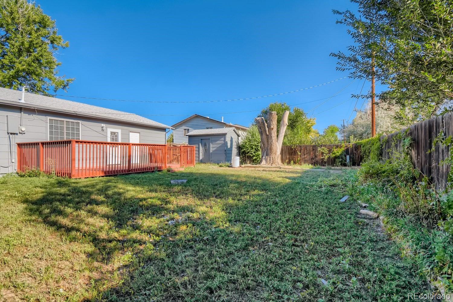 7480 Wolff Street Westminster, CO 80030 - Photo 16 of 16 a front view of a house with garden