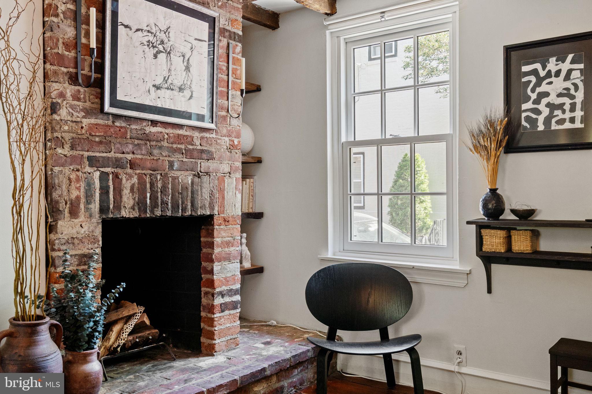 142 Carpenter Street Philadelphia, PA 19147 - Photo 7 of 49 a living room with furniture and a fireplace