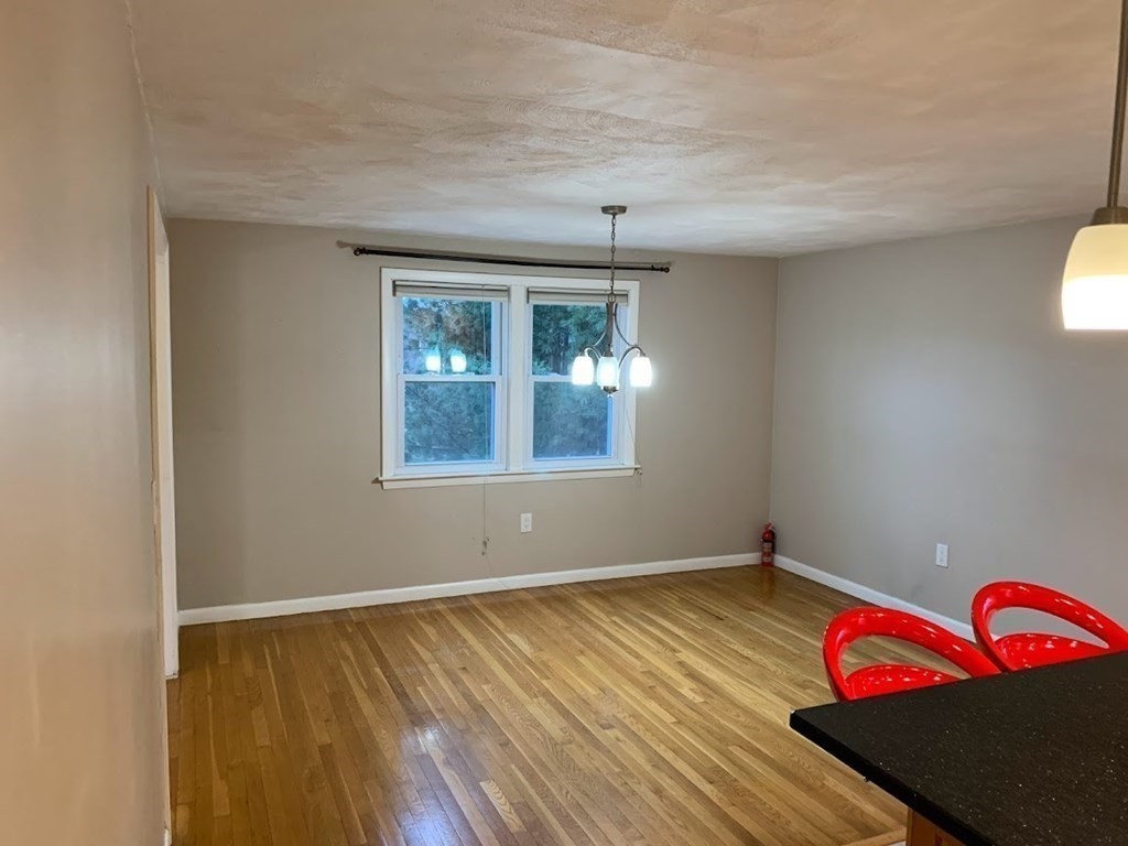 12 Burning Tree Road Natick, MA 01760 - Photo 4 of 34 an empty room with window