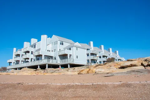 a large building with a view of the ocean