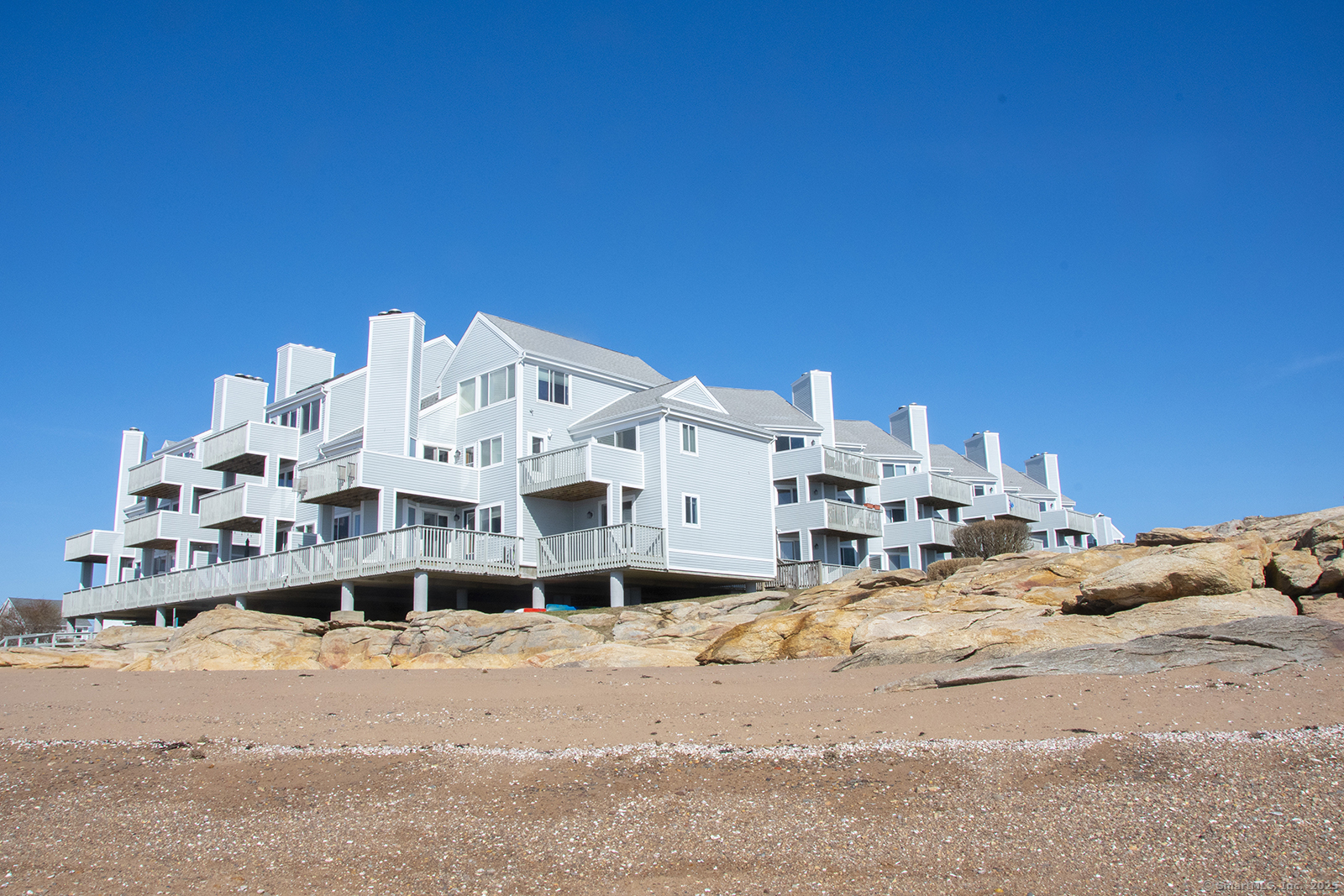 a large building with a view of the ocean