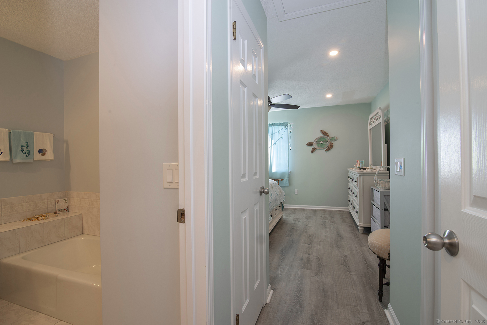 1 Mansfield Grove Road, Unit 306 East Haven, CT 06512 - Photo 22 of 31 a bathroom with a bathtub and shower
