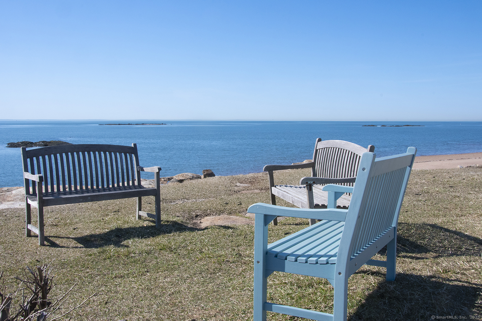 1 Mansfield Grove Road, Unit 306 East Haven, CT 06512 - Photo 25 of 31 a view of a balcony with two chairs and a table