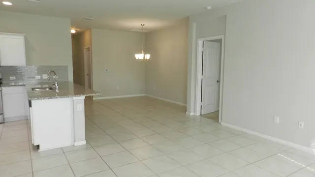 a bathroom with a glass door shower