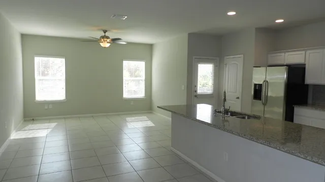 a view of an entryway of a house and chandelier