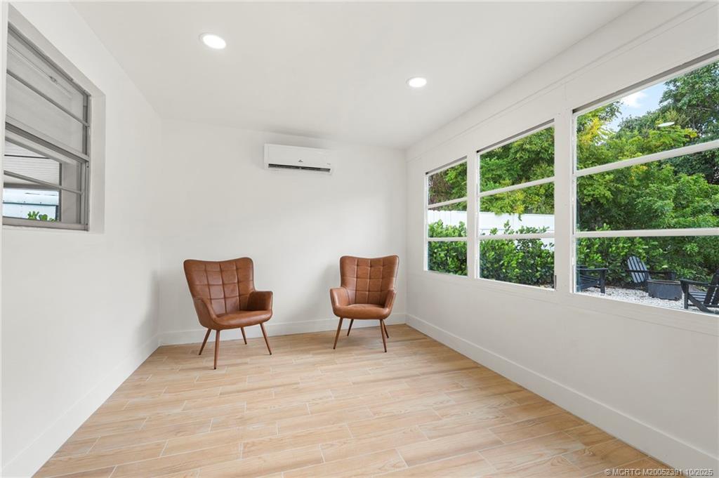 30 Southwest Hideaway Place Stuart, FL 34994 - Photo 15 of 45 a living room with furniture and a window