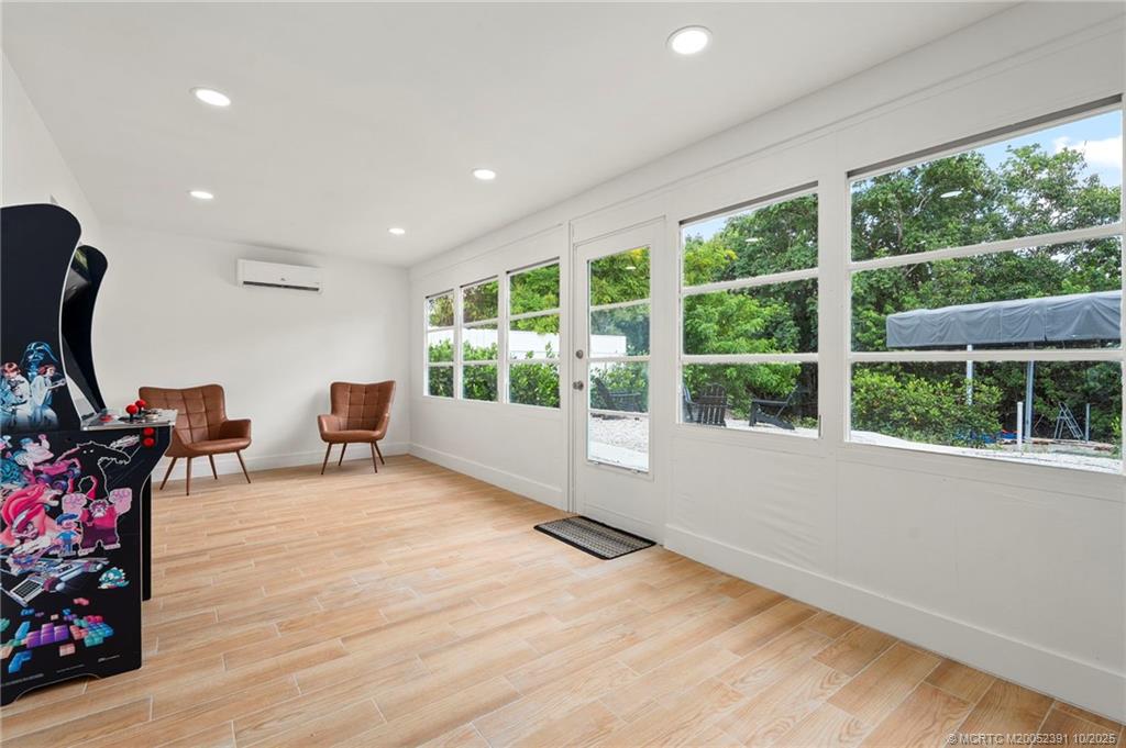 30 Southwest Hideaway Place Stuart, FL 34994 - Photo 17 of 45 a view of a room with furniture wooden floor and windows