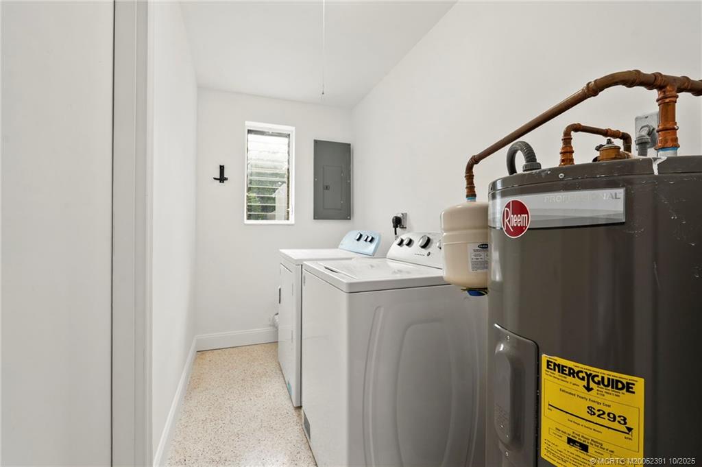 30 Southwest Hideaway Place Stuart, FL 34994 - Photo 23 of 45 a utility room with dryer and washer