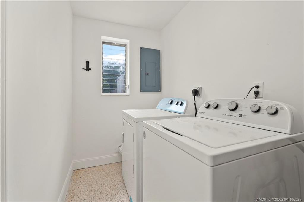 30 Southwest Hideaway Place Stuart, FL 34994 - Photo 24 of 45 a utility room with dryer and washer