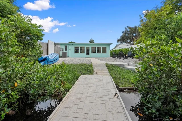 a view of yard with patio