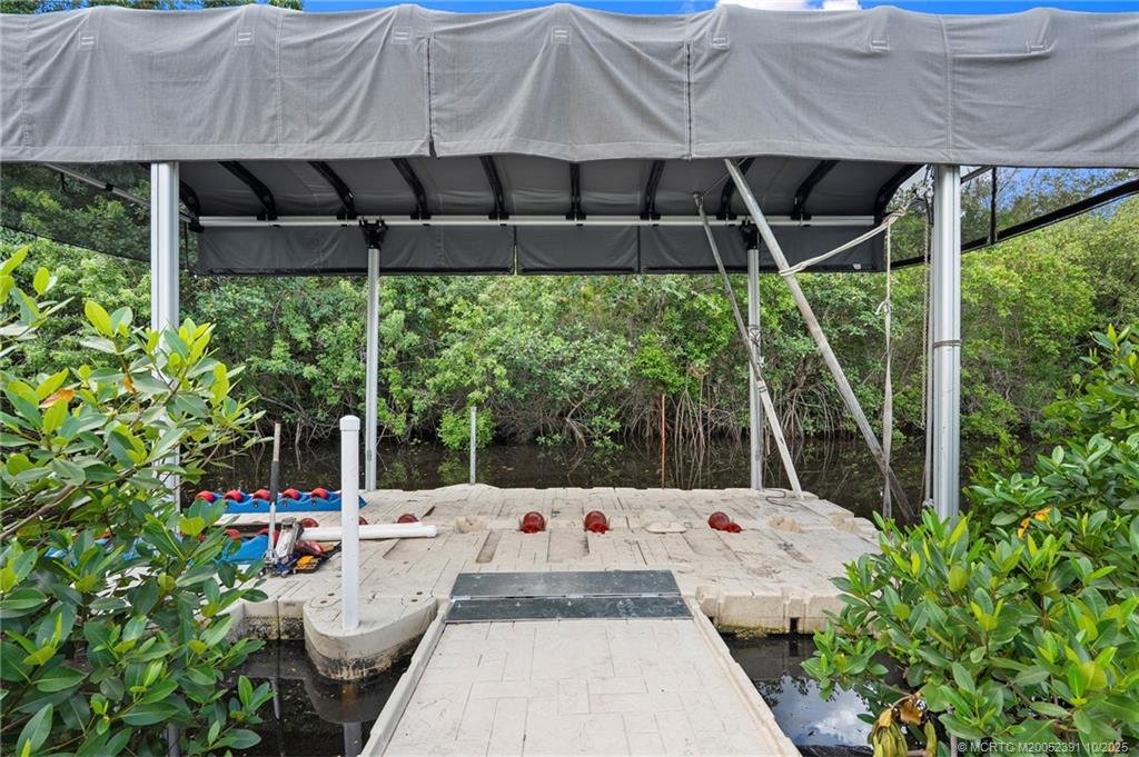 30 Southwest Hideaway Place Stuart, FL 34994 - Photo 32 of 45 a view of yard with patio