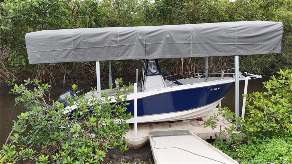 30 Southwest Hideaway Place Stuart, FL 34994 - Photo 33 of 45 a view of outdoor space yard and patio